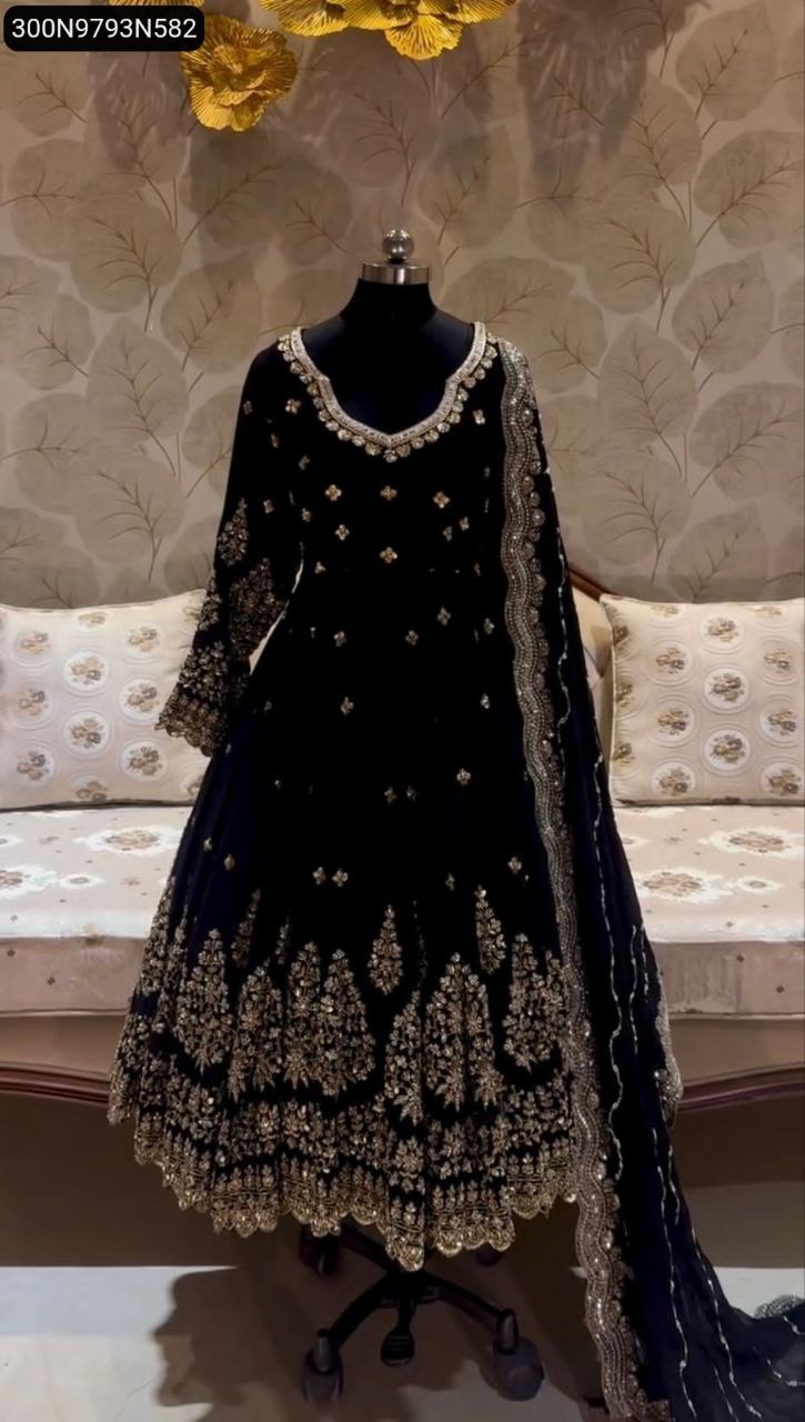 Elegant Black Fox Georgette Gown with gold sequence embroidery on a mannequin, perfect for festive occasions.
