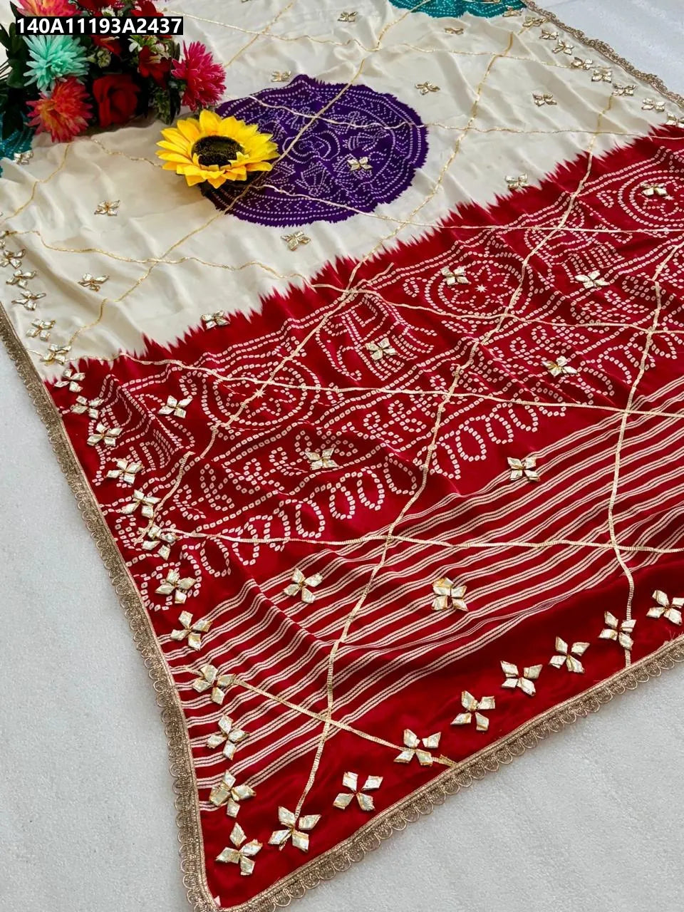 TRENDBUY Gajji Bandhej Silk Saree with red and white pattern and purple bandhini circle, golden gota work details, flat lay