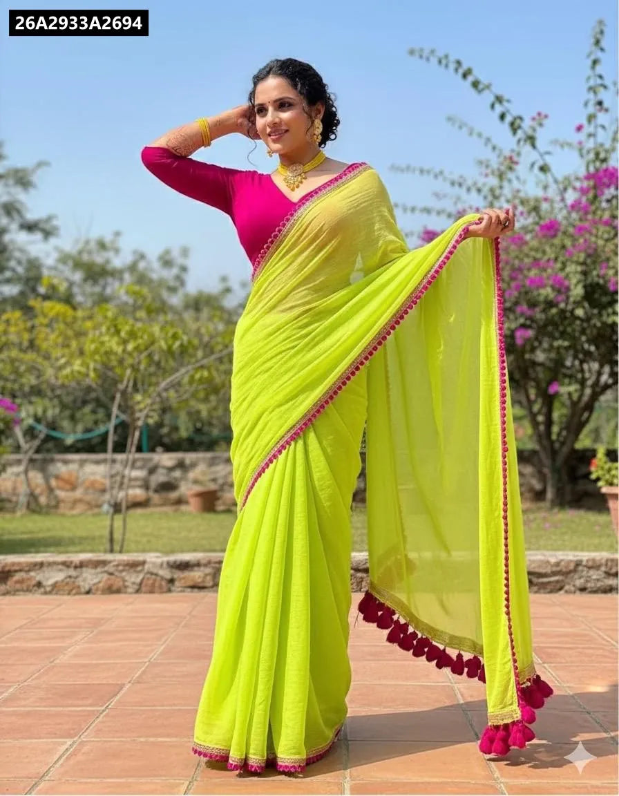 Front-facing model in a vibrant lime green Georgette saree with pink lace border, perfect for festivities.