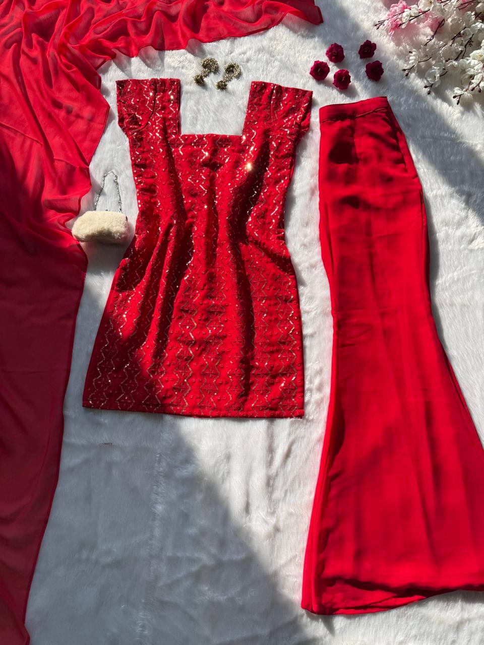 Crimson Red Georgette Sequencework Kurta Set with dupatta and palazzo on white fur background