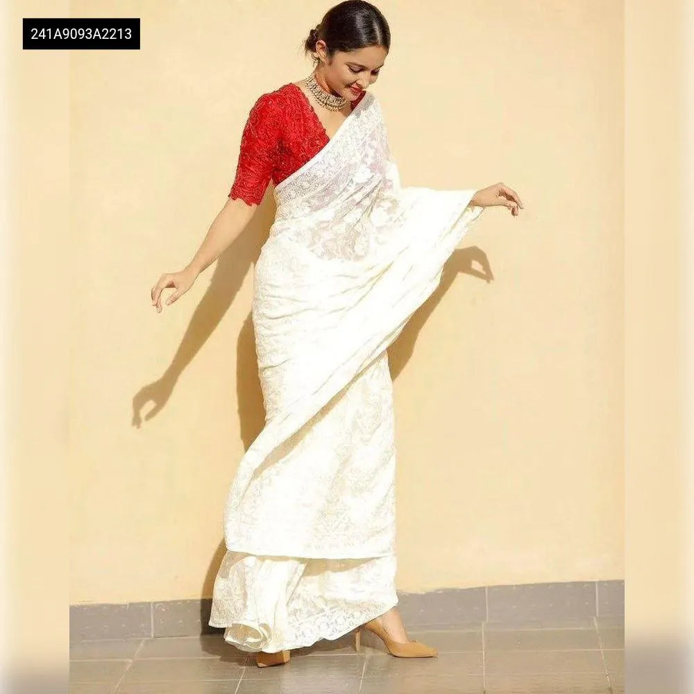 Model wearing TRENDBUY Georgette Sequin Embroidered Saree with red blouse, full view