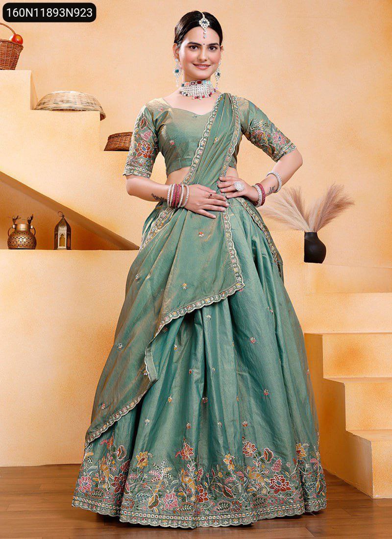 Stunning model in Green Gold Crush Embroidered Lehenga, full body front view, smiling at camera, perfect for weddings.