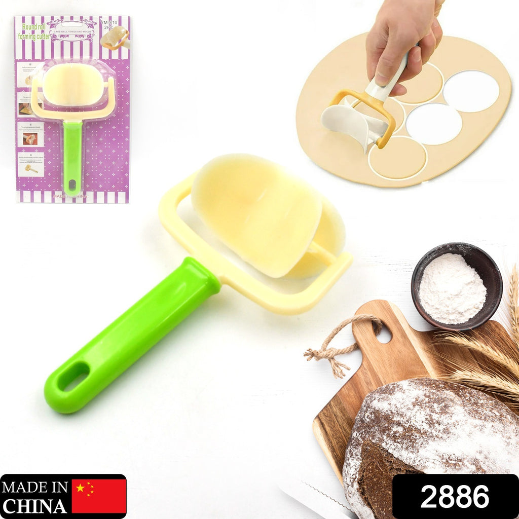 White plastic round roll forming puri cutter for baking and cake balls.