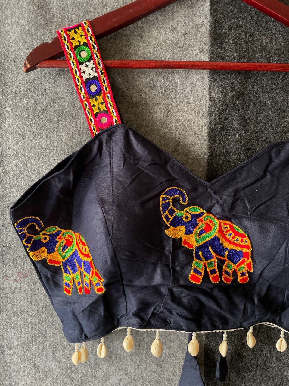 Close-up of intricate traditional embroidery patterns on premium magic cotton fabric
