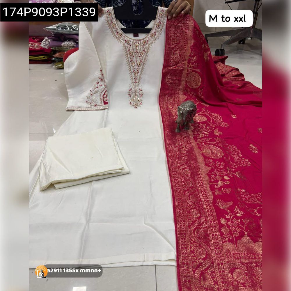 Full set view of elegant white Maslin hand work kurti with pant and a luxurious red Banarasi dupatta.