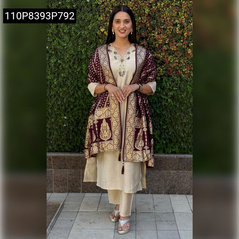 Model wearing Cream Roman Silk Hand Work Suit with Maroon Nylon Muslin Jacquard Dupatta, smiling.