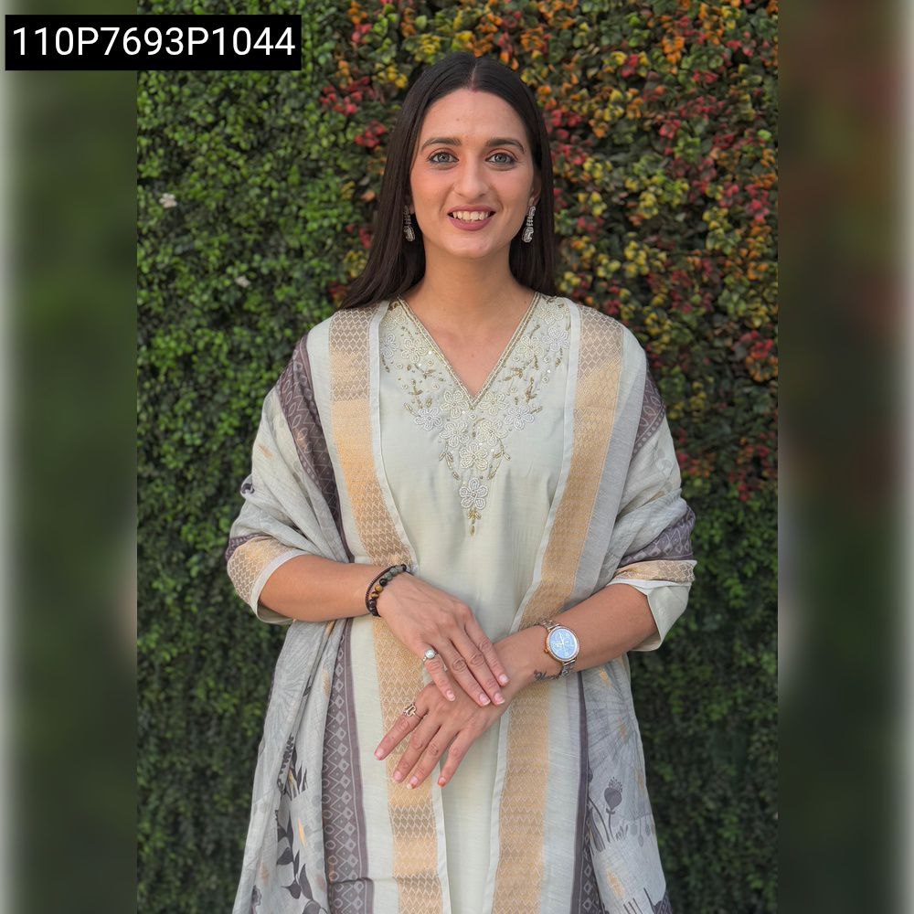 Woman modeling Light Pista Roman Silk hand work suit with Chanderi Jacquard dupatta, front view.