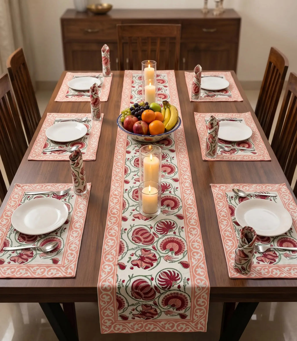 Hand block print pink cotton table mat set with runner on dining table