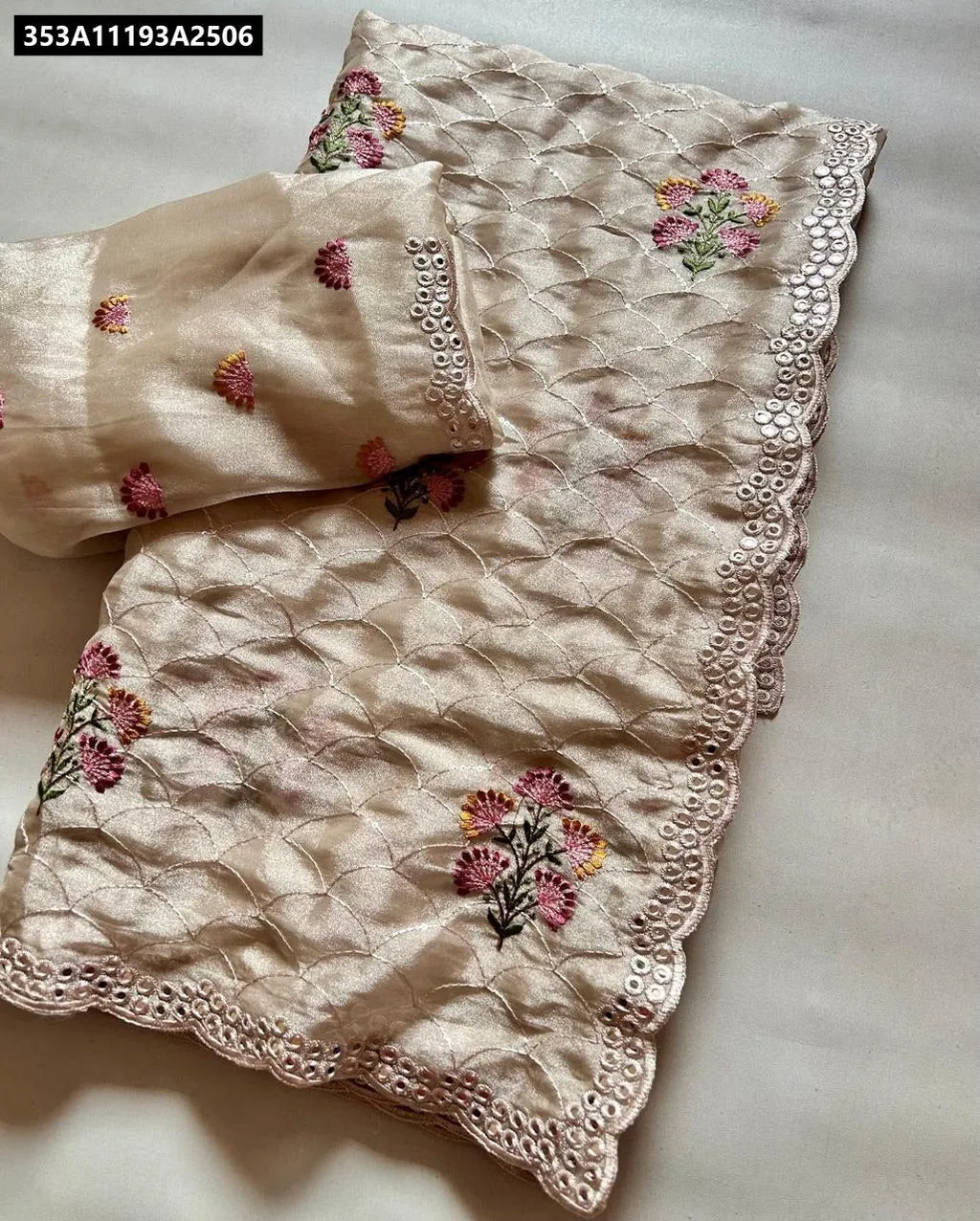 TRENDBUY Handtouch Sequence Glass Tissue Saree in Light Beige with embroidered floral motifs and mirror work border, with matching unstitched blouse piece, flat lay.