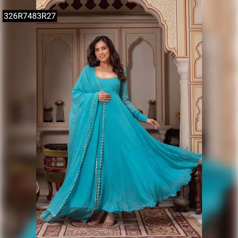 Model wearing a vibrant Aqua Blue Fox Georgette Anarkali Suit, front facing, showcasing the full flare and elegance of the dress.