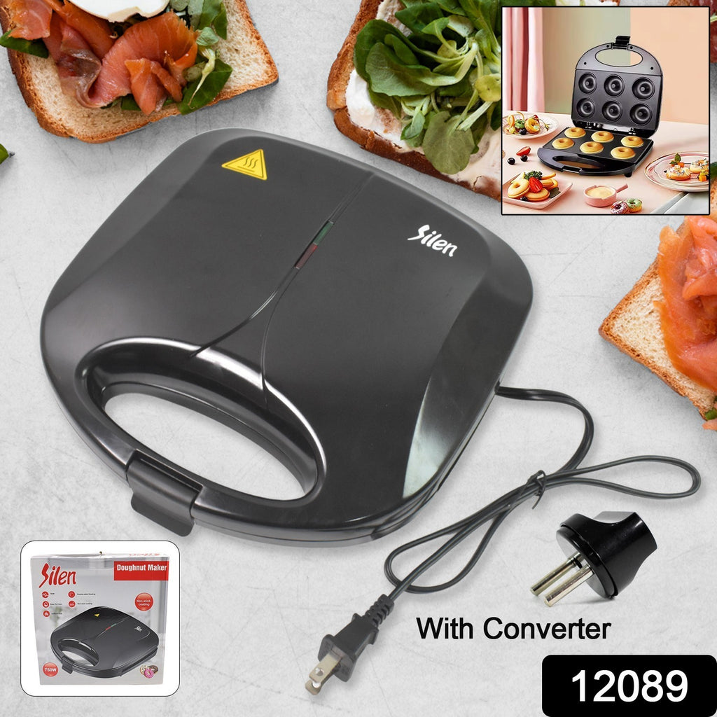 Closed white 750w electric donut maker machine for 6 circle-shaped donuts.