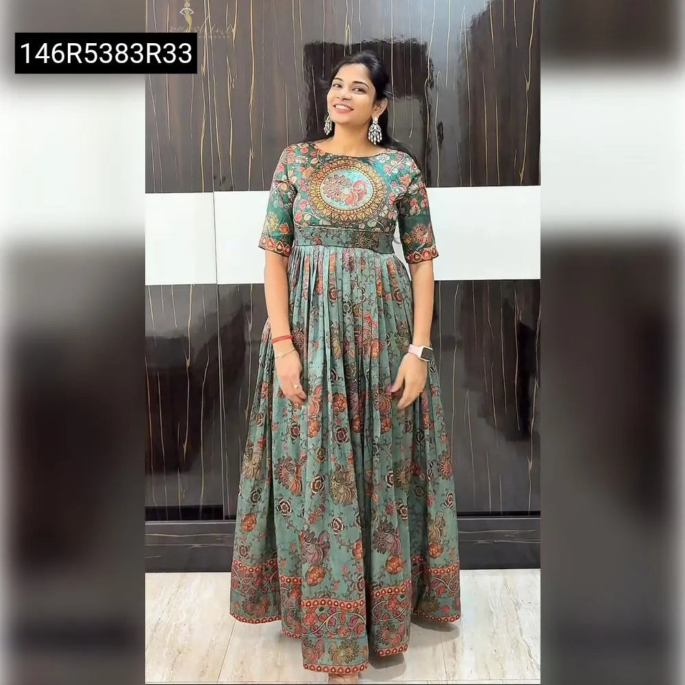 TRENDBUY woman modeling Teal Green Kalamkari Digital Printed Gown with traditional motifs, front view