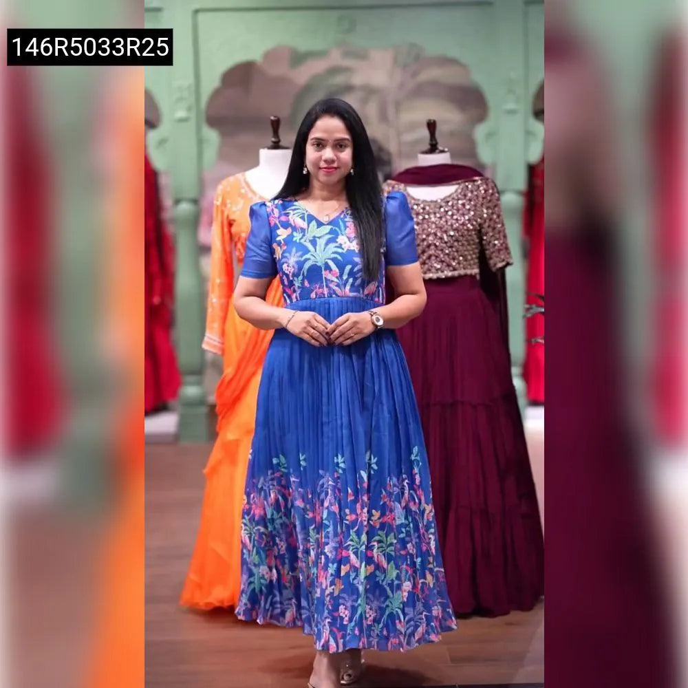 Full body view of a model wearing TRENDBUY's stunning Azure Blue Kalamkari Digital Printed Gown, perfect for parties and festivals, with an elegant background.