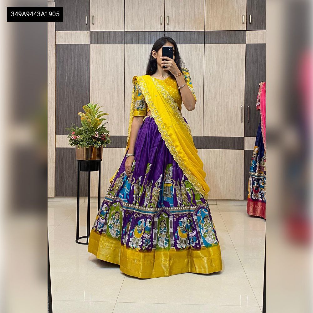 TRENDBUY Kalamkari Print Dola Silk Lehenga in Purple and Yellow worn by model, front view.
