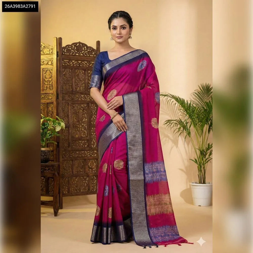 Vibrant Rani Pink Kanjivaram Print Saree with blue and silver zari border, worn by a model standing gracefully.