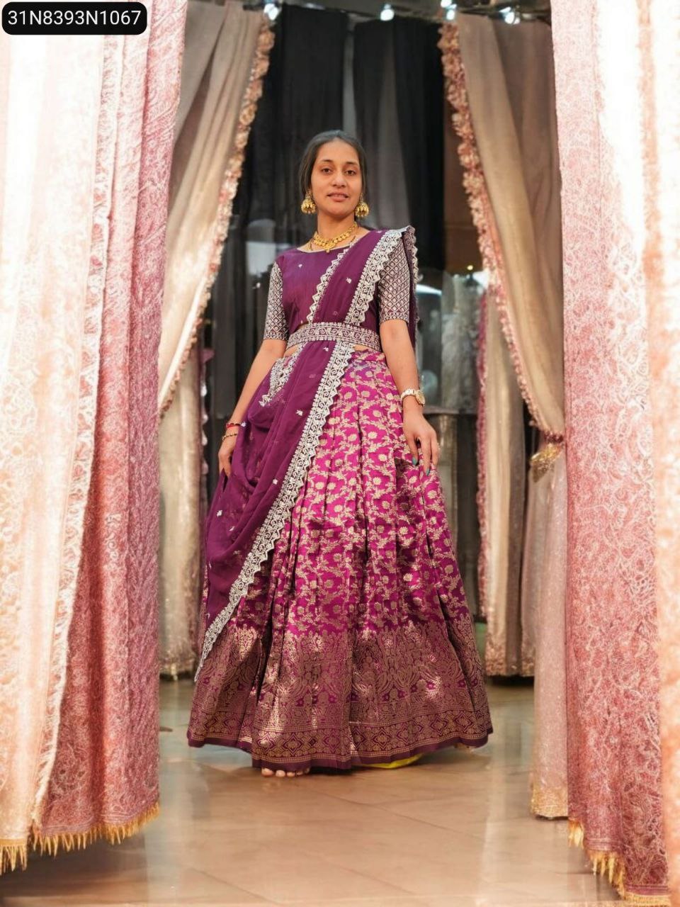Woman in Plum Kanjiveram Silk Zari Half Saree Lehenga with belt, front view