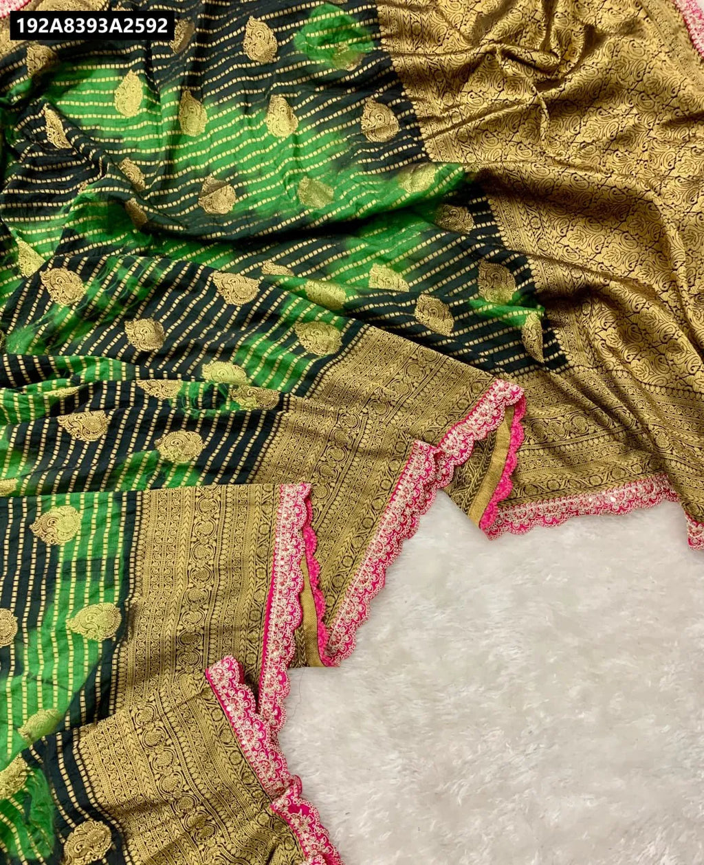 Emerald Green and Black Khadi Crepe Silk Saree with Gold Jari and Pink Border