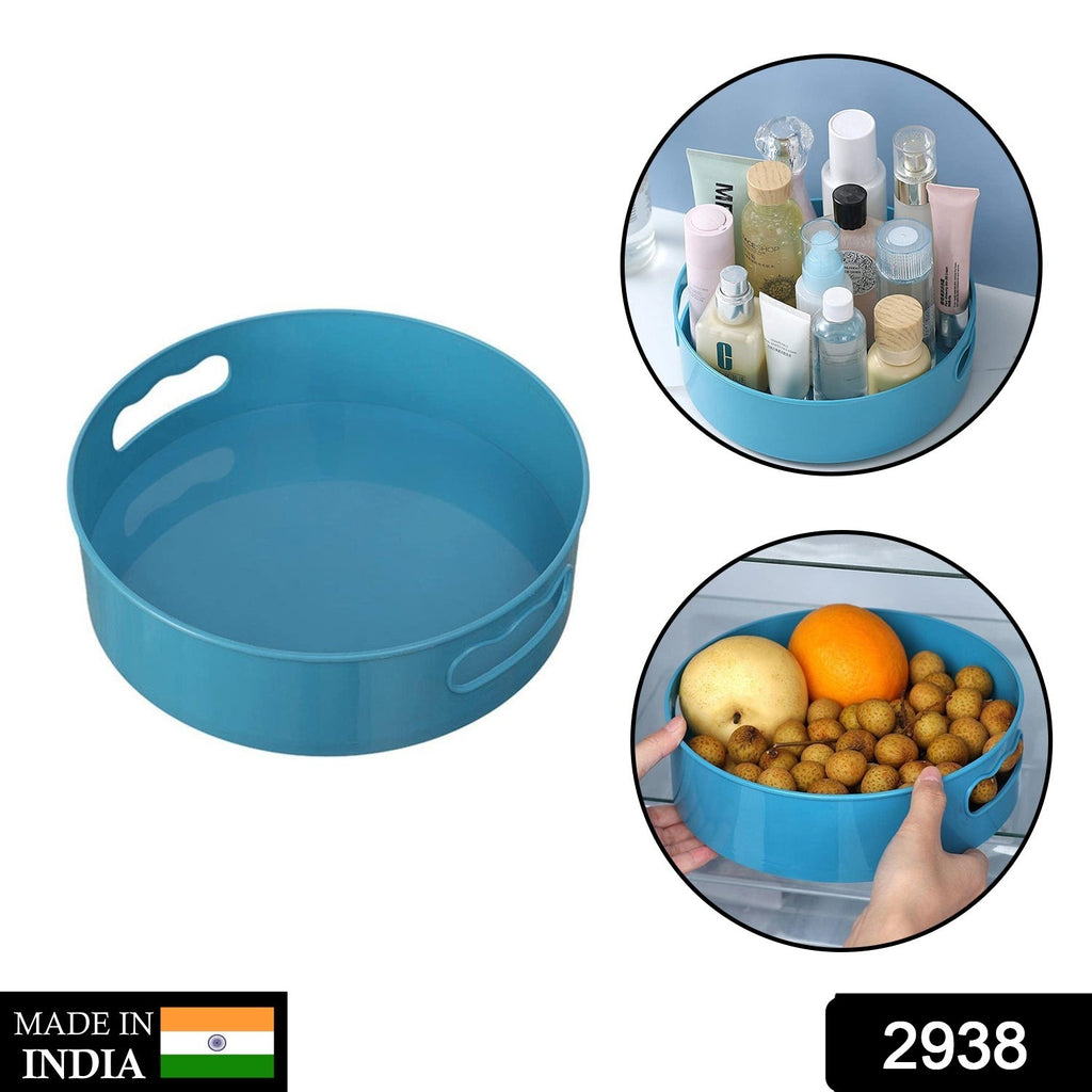Clear plastic 360 rotating multi-function organizer tray holding spices and bottles in a pantry.