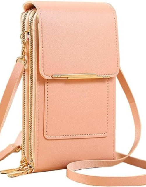 Leather shoulder bag, also functions as a mobile purse and cosmetic bag.
