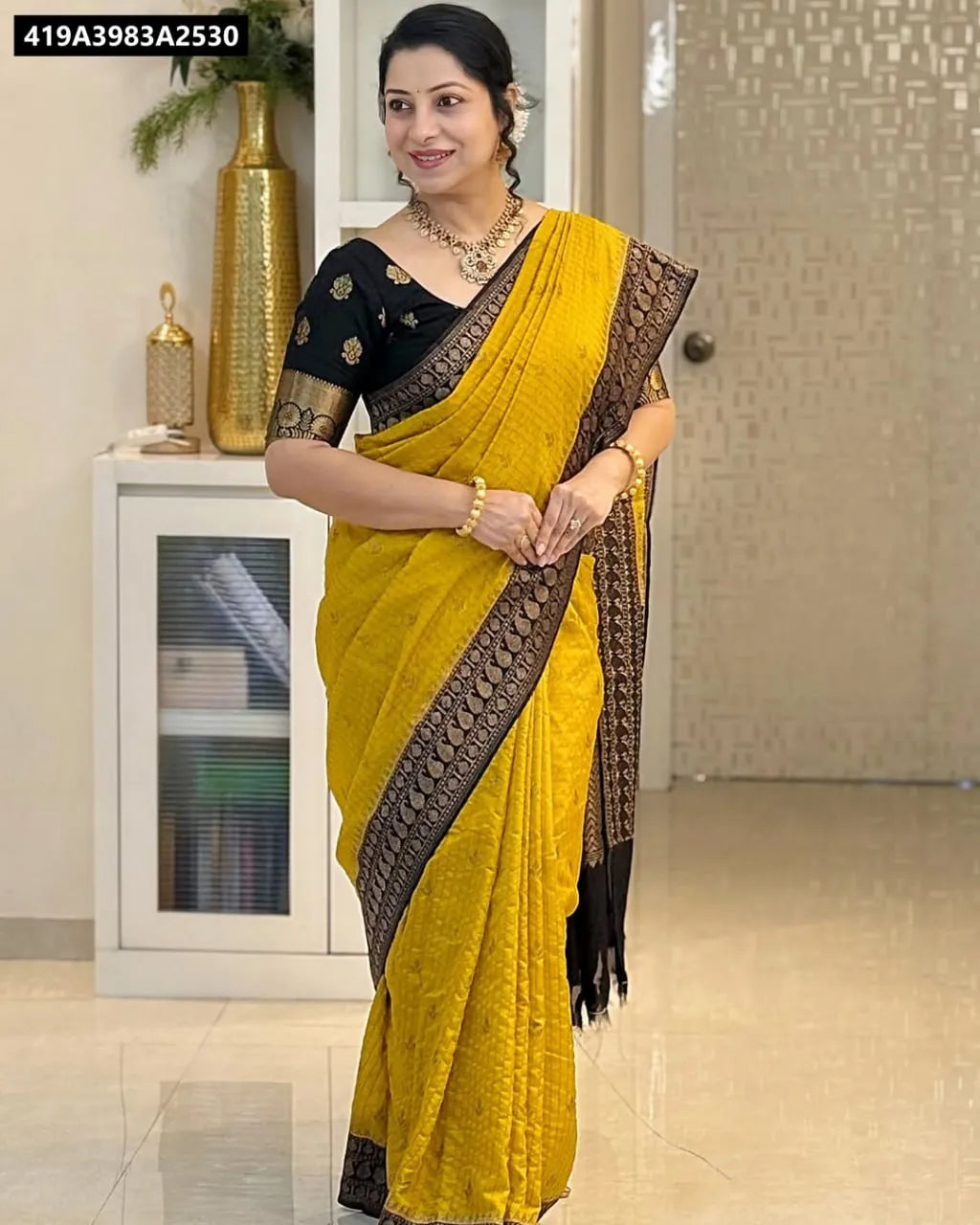TRENDBUY Lichi Silk Saree in Yellow with Black Jacquard Border and Contrast Blouse, front view on model