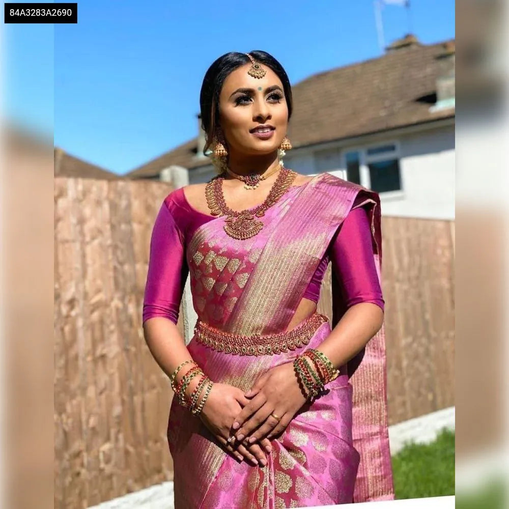 Beautiful model wearing a Fuschia Pink Lichi Silk Jacquard Saree from TRENDBUY, perfect for festive occasions
