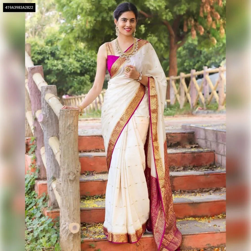 Model wearing Off-White Lichi Silk Saree with pink border and blouse, showcasing rich pallu and jacquard work.
