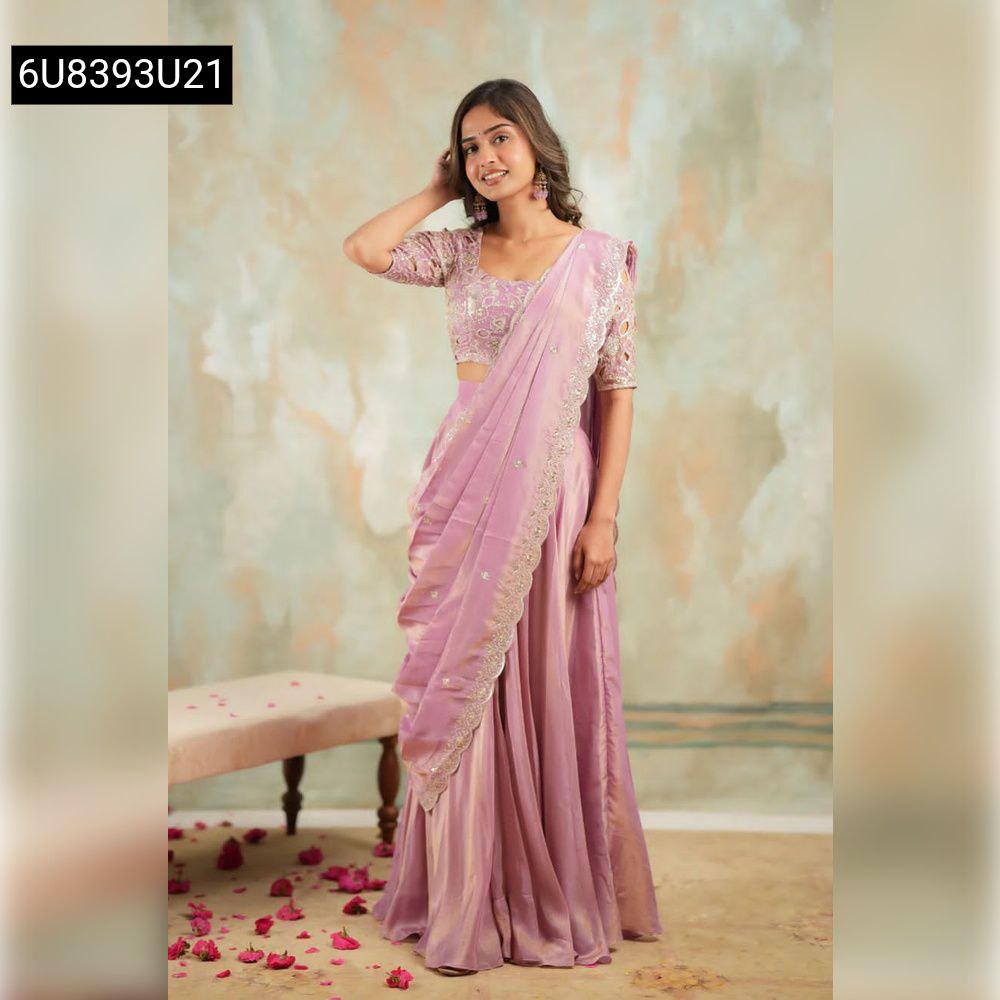 Full body shot of a woman in a beautiful lilac Vichitra silk lehenga with delicate cutwork embroidery, posing gracefully.
