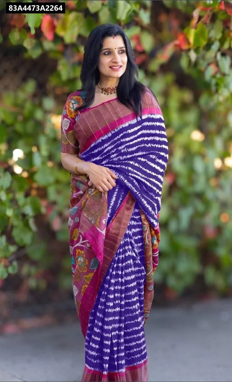 Woman posing in an Indigo Blue Linen Digital Print Bandhani Saree with gold zari border and matching blouse by TRENDBUY.