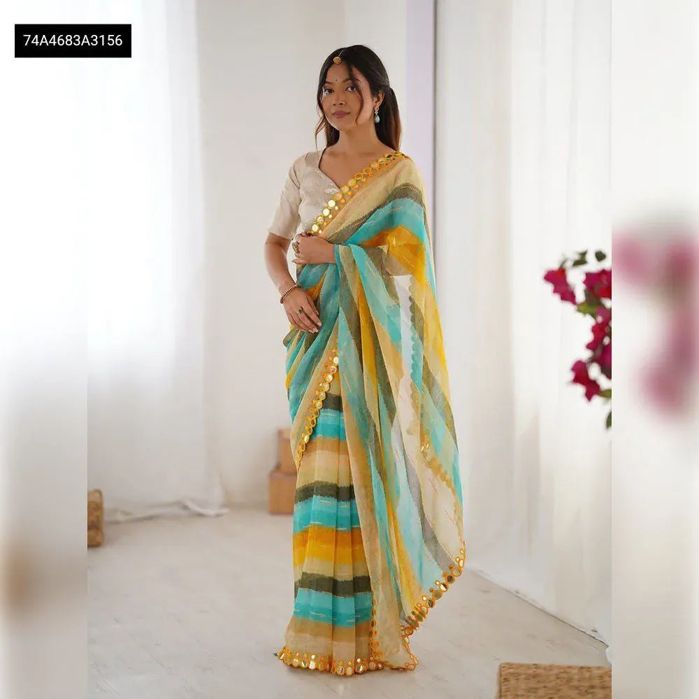TRENDBUY woman in a yellow and blue striped linen leria look saree with mirror border, front view.