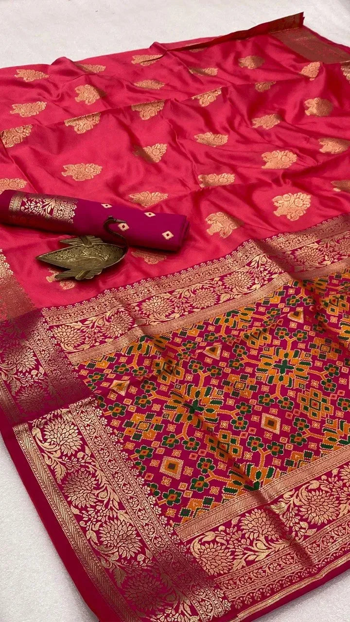 Pink designer silk saree with gold zari border and motifs