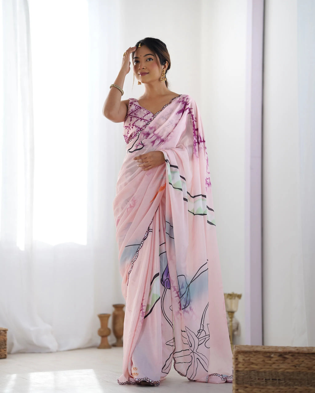 Front full view of model showcasing heavy chinnon saree