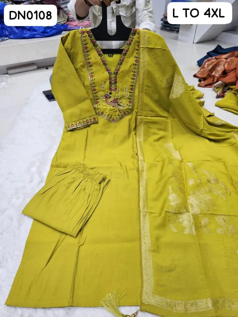Olive green heavy Roman silk kurta set with intricate embroidery and matching dupatta