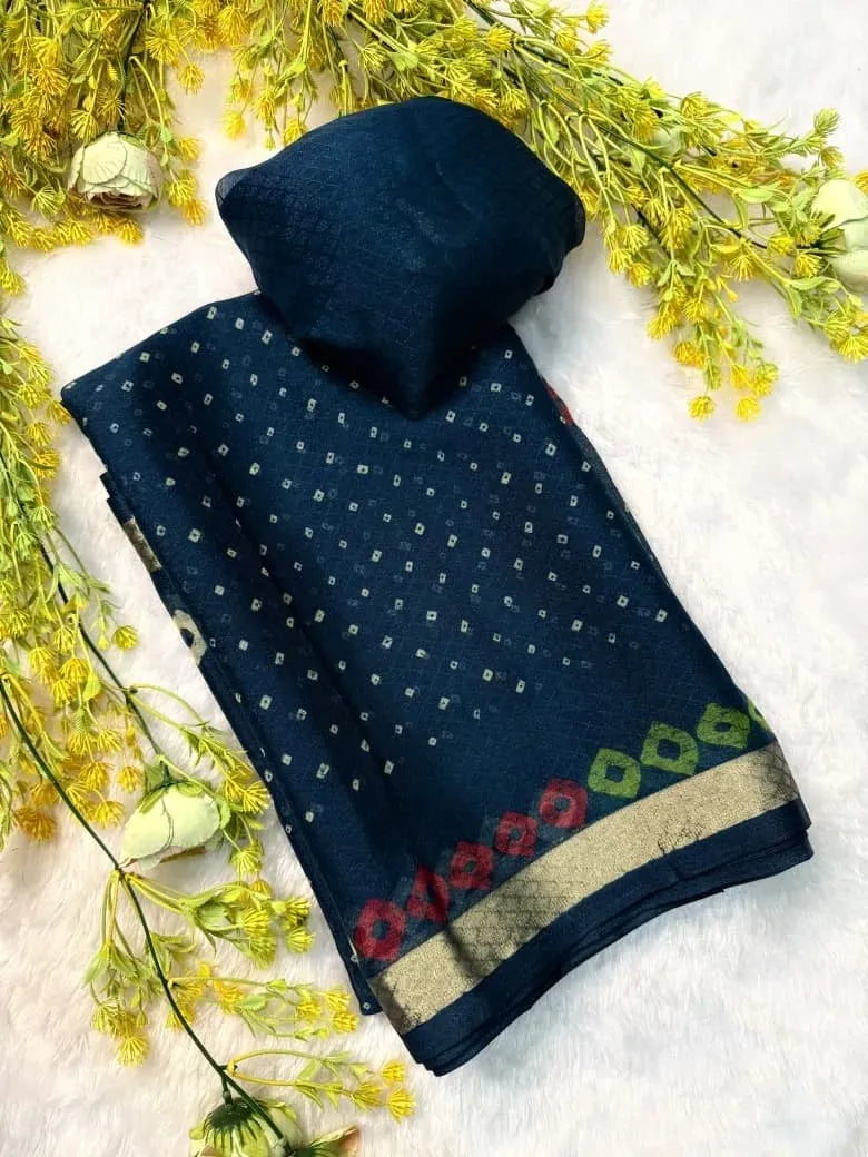 Navy blue premium Italian silk saree folded with fine bandhani print and a golden zari border on white fur