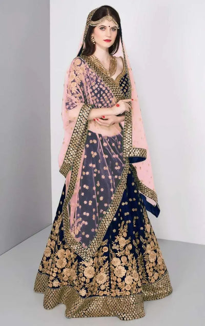 Luxe Velvet Bridal Lehenga Choli with Heavy Gold Embroidery for Weddings