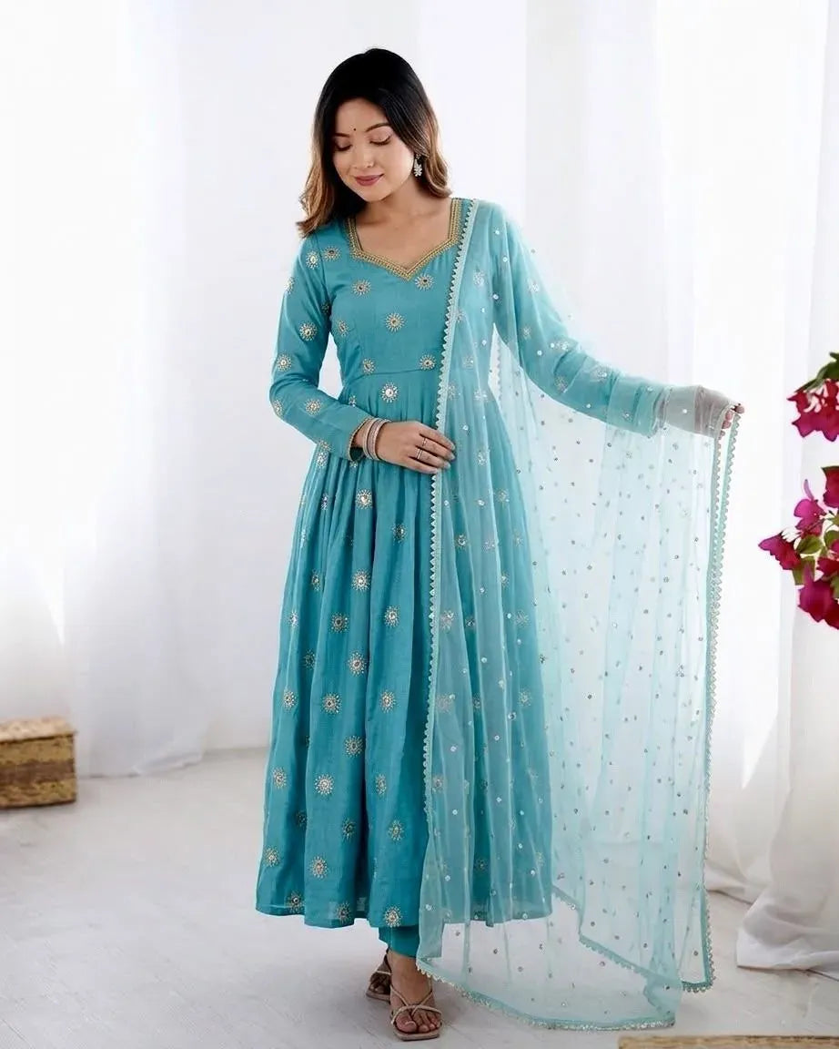 Full length view of woman in teal blue ethnic gown and tissue dupatta