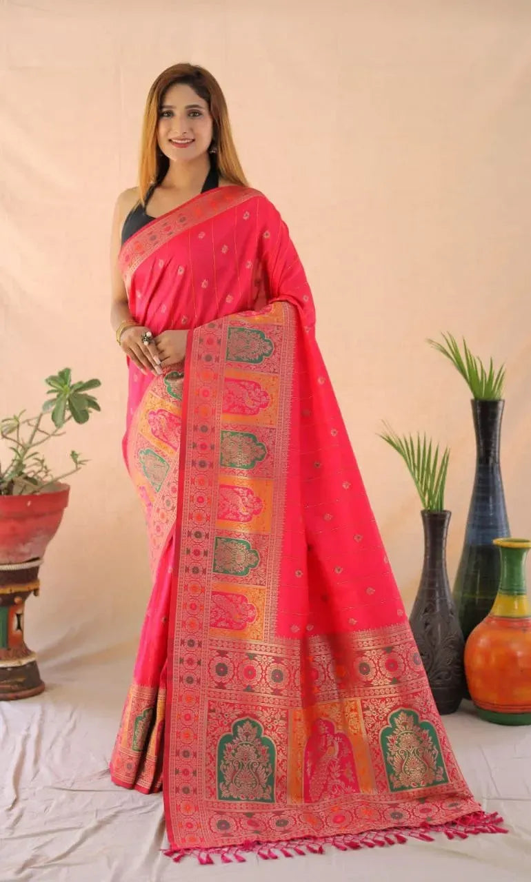 Full body view of model in gajari pink banarasi silk saree