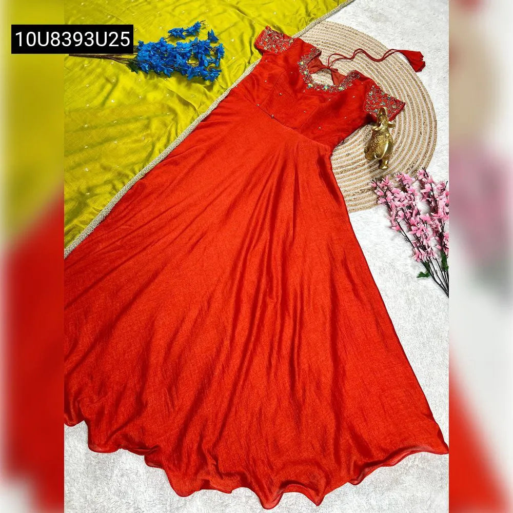 Flat lay of a Scarlet Red Madhuri style Vichitra Silk gown with embroidered details and a Chinnon Silk dupatta.