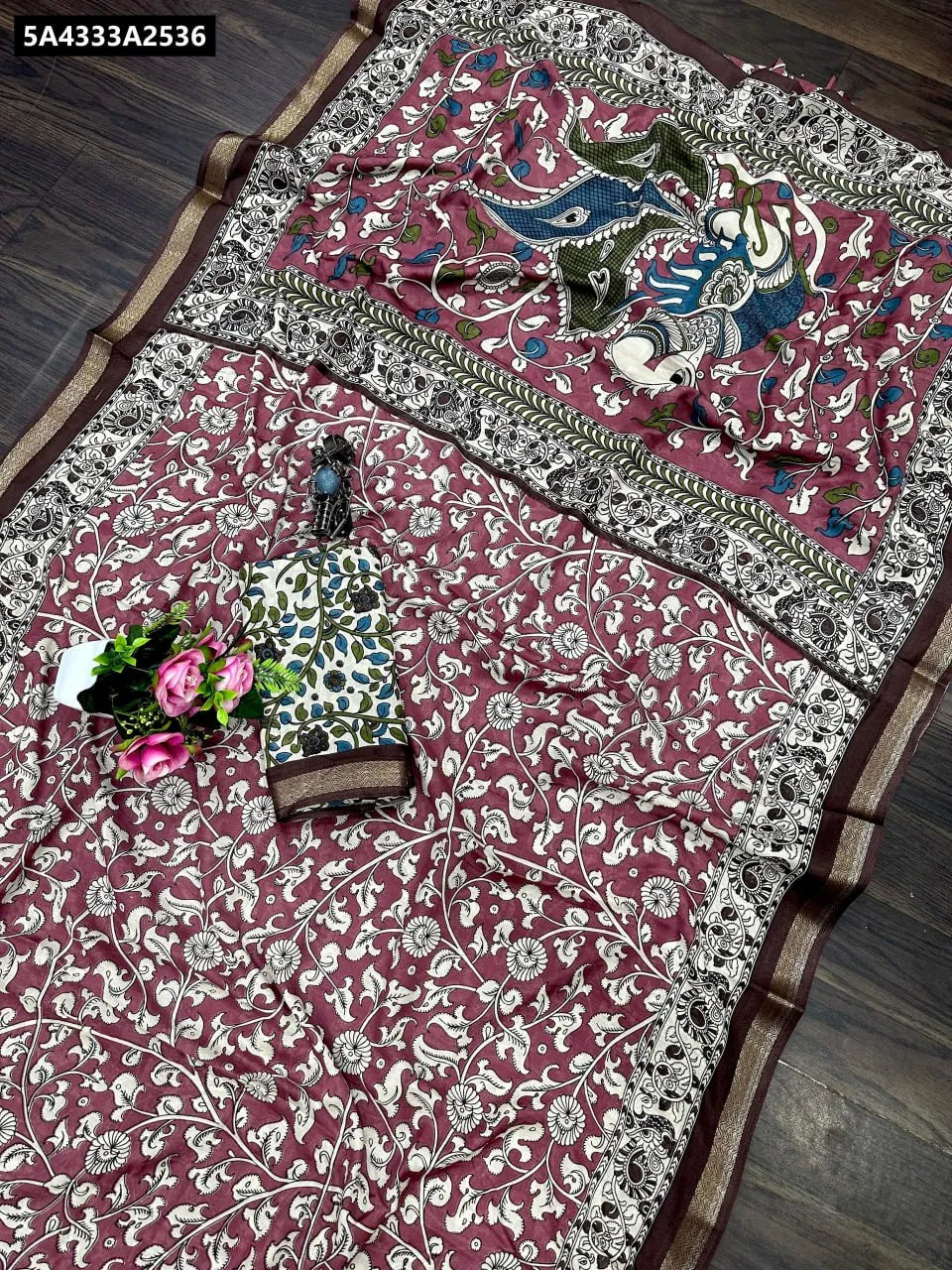 Maroon Mangalagiri Silk Cotton Kalamkari Print Saree flat lay with matching blouse and ethnic accessories