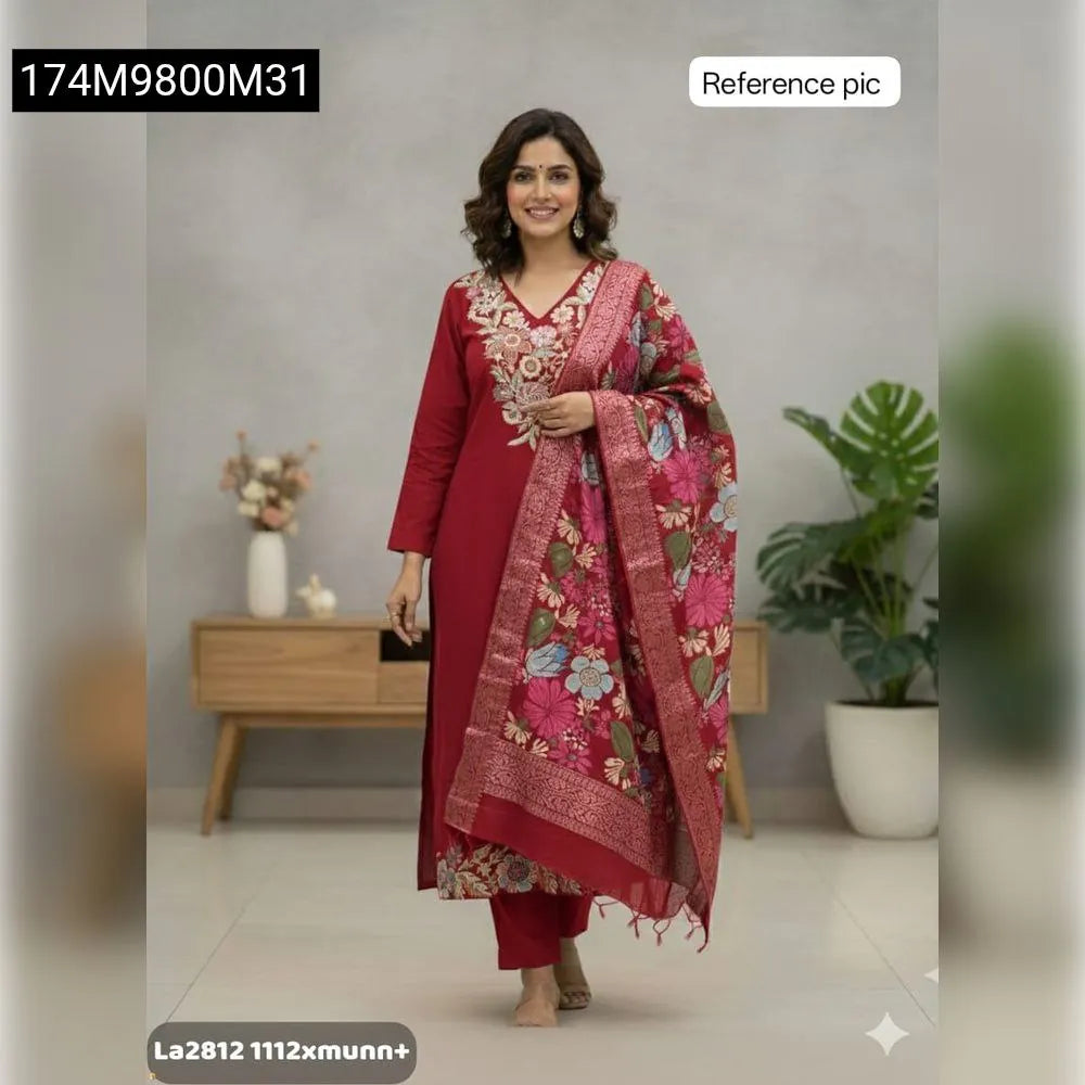 Full-length view of a woman in a red Maslin silk kurti set with intricate handwork and a floral digital print dupatta.
