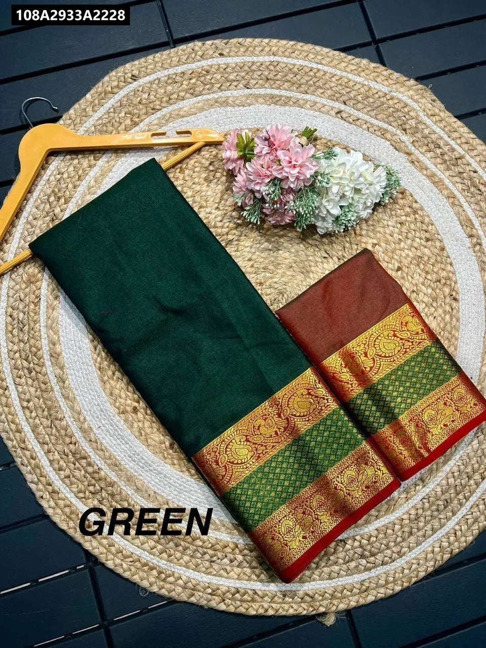 Green Mercerised Cotton Silk Saree with golden border and red pallu detail, flat lay on jute rug