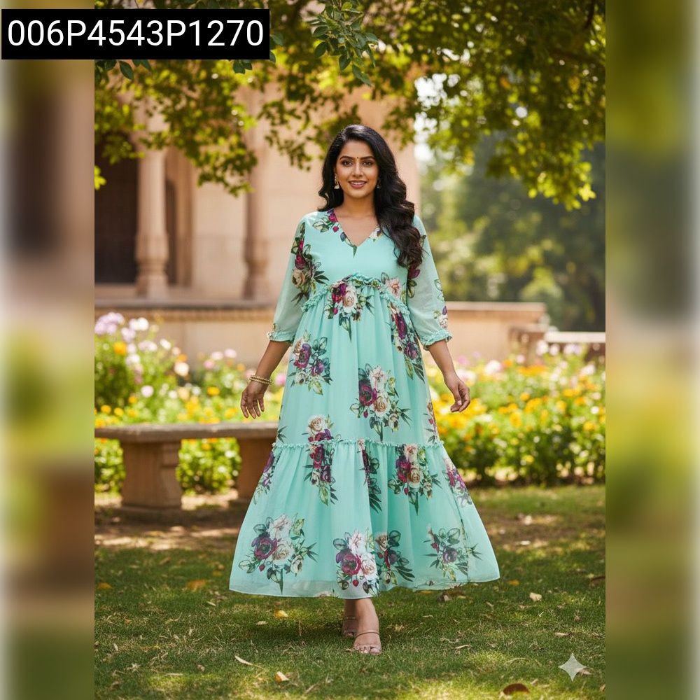 Front view of a smiling model wearing the Mint Floral Surplice Women's Maxi Dress, standing in a lush garden.