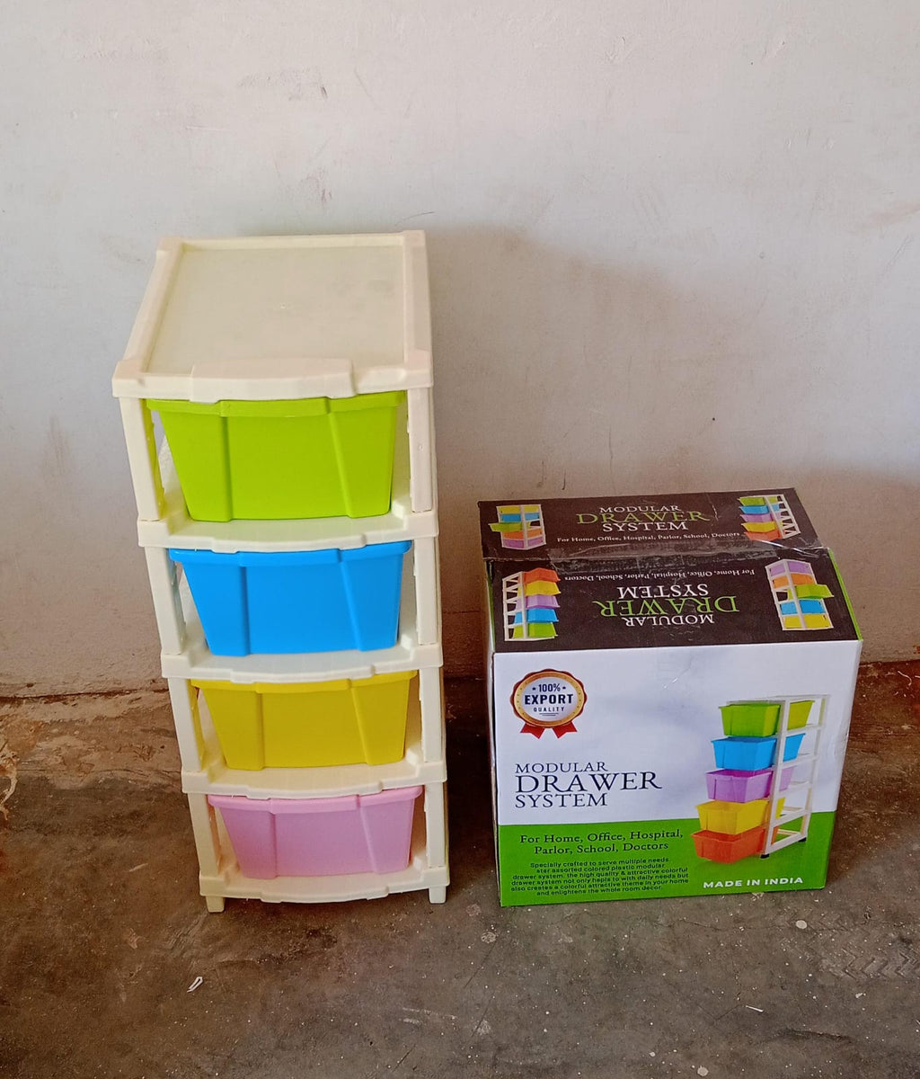 Close-up of four pastel-colored removable storage bins stacked vertically in a white plastic frame