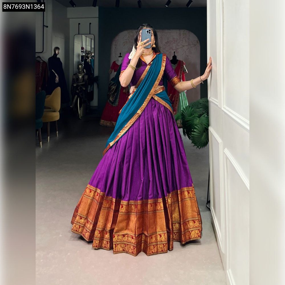 Full body front view of model in Royal Purple Narayan Pet Zari Weaving Lehenga with blue dupatta.