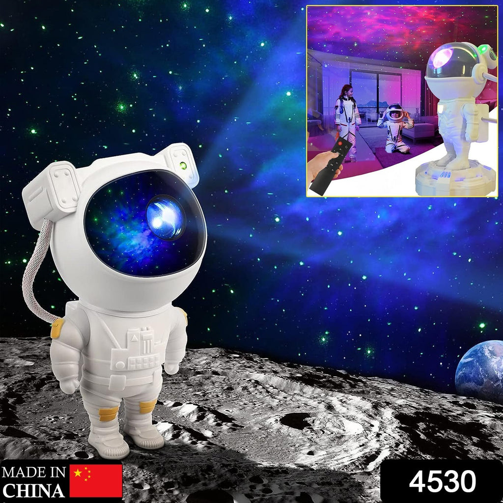 Astronaut galaxy projector filling a dark bedroom with vibrant starry sky and nebulae.