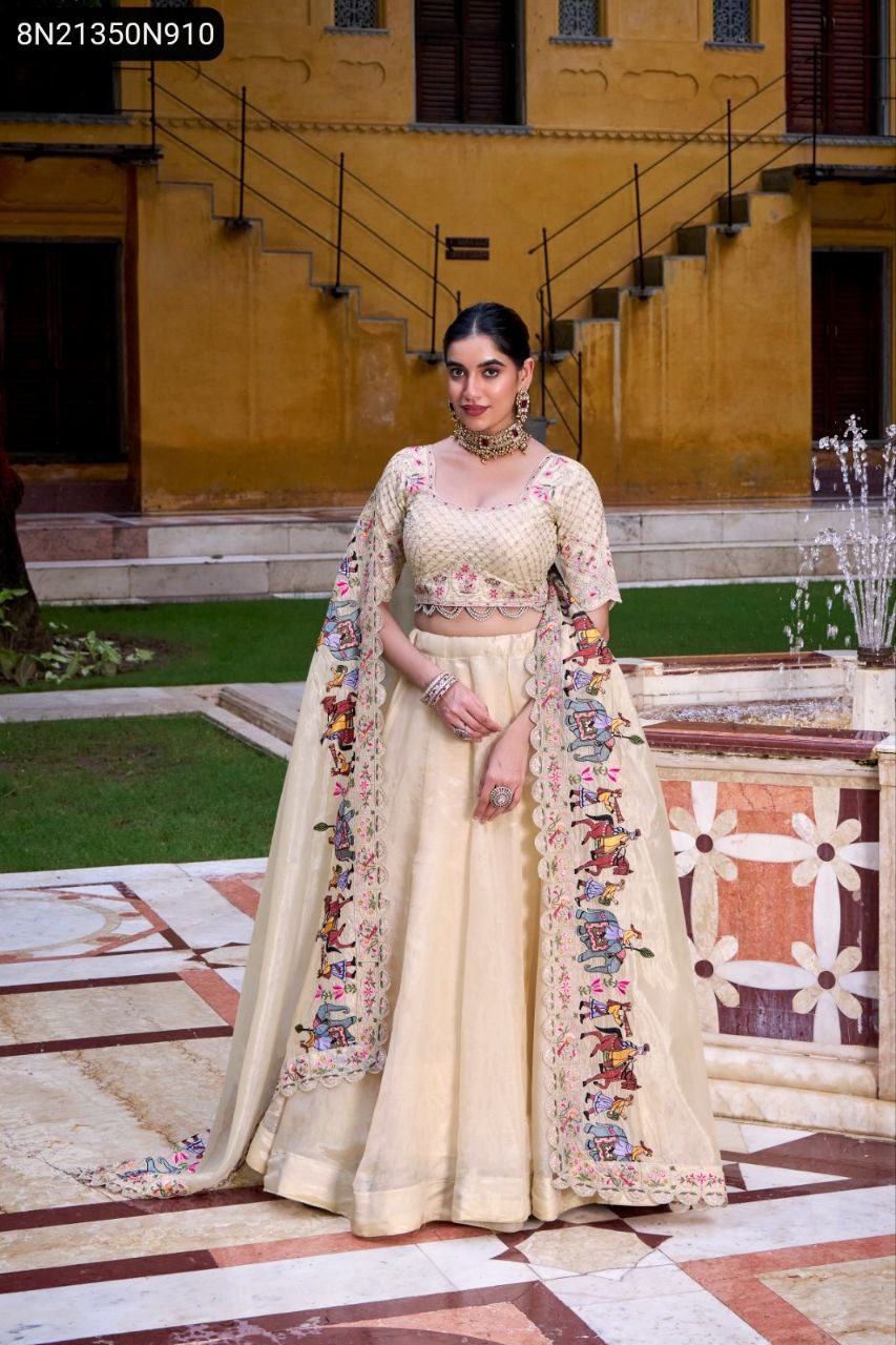 Full shot of model in an Off White Raspberry Lehenga Choli with intricately embroidered dupatta.