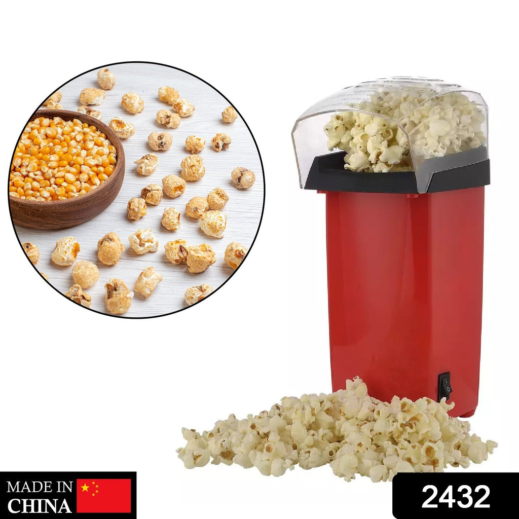 Countertop electric snack maker, a red popper machine with fresh popcorn.