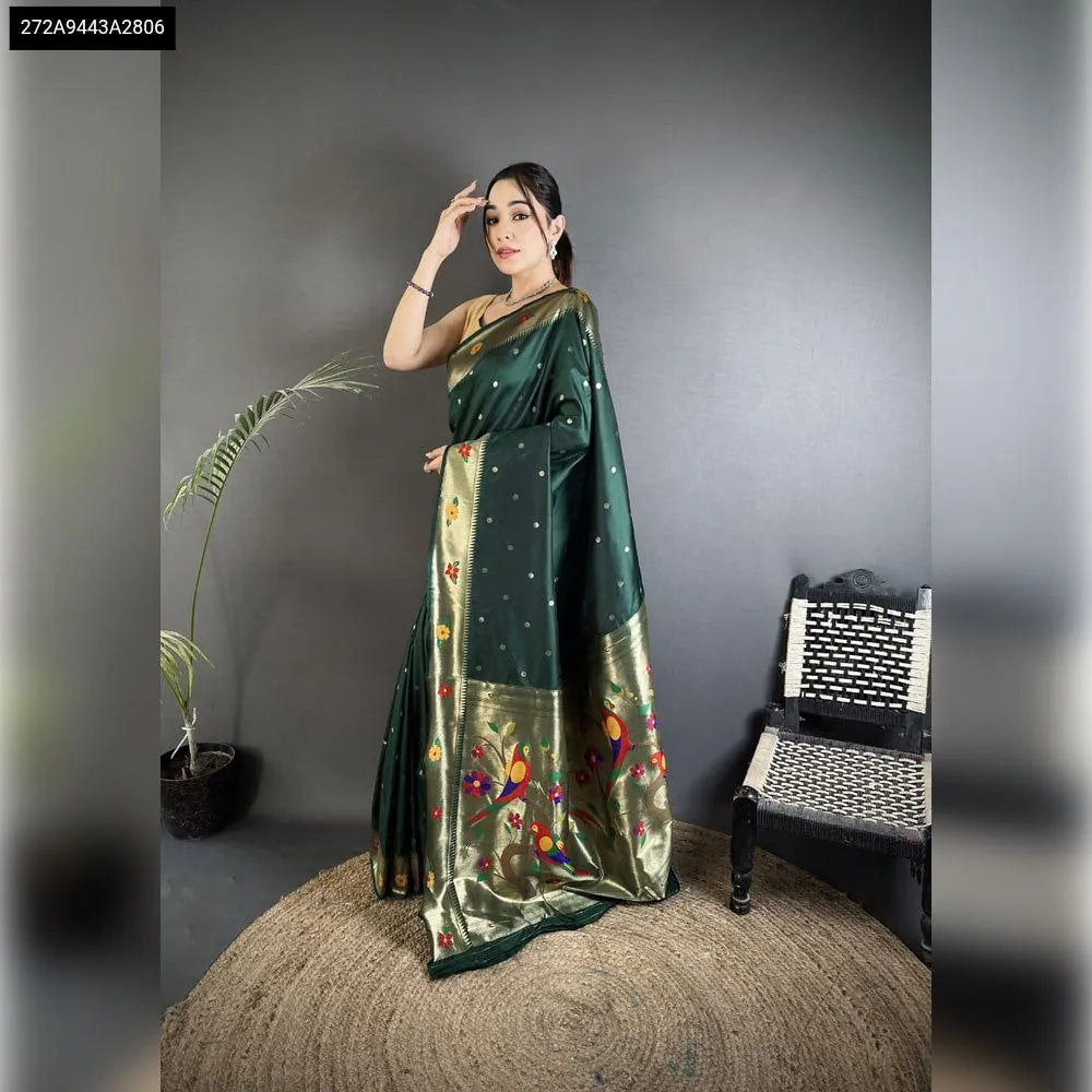 Model wearing a Dark Green Paithani Lichi Silk Saree with elegant bird motif pallu