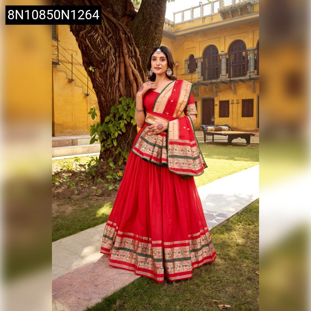 TRENDBUY Paithani Zari Weaving Lehenga in Red, model standing elegantly outdoors, looking at the camera.
