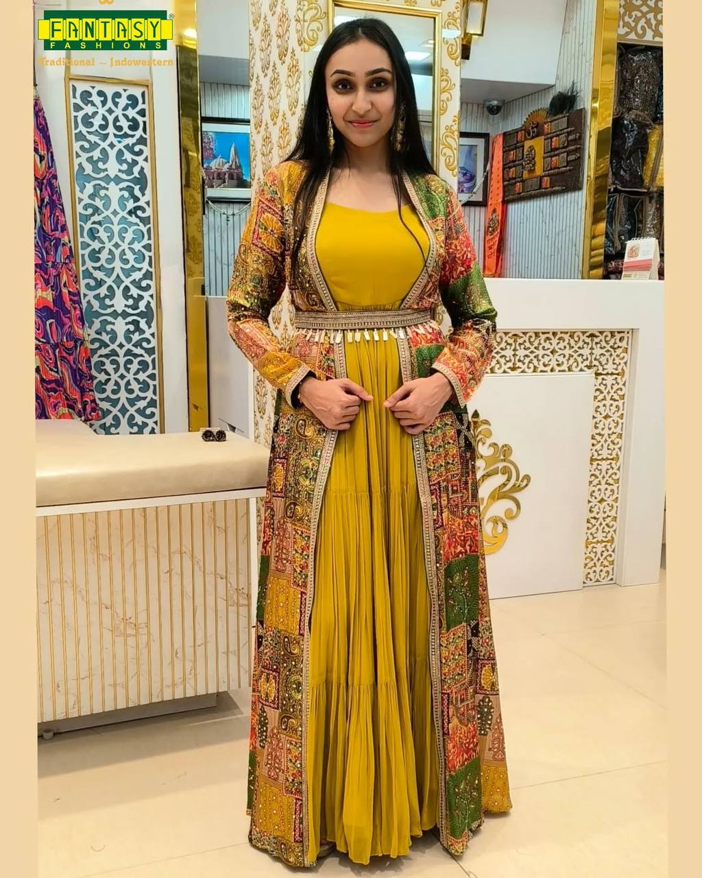 Front view of a model wearing a Sunshine Yellow Pakistani designer frock set with a long, multi-color printed Koti and belt, perfect for party wear.