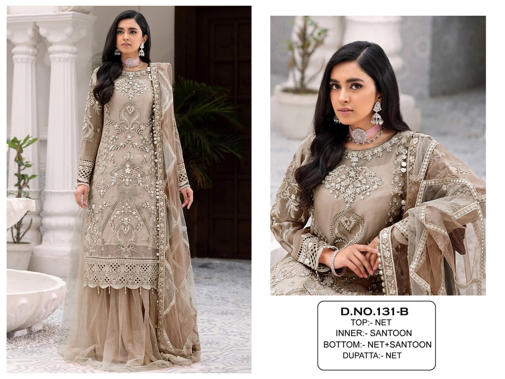 Woman posing in a stunning Taupe Pakistani embroidered net anarkali suit with heavy sequence and diamond work, paired with matching dupatta and palazzo. TRENDBUY ethnic wear.